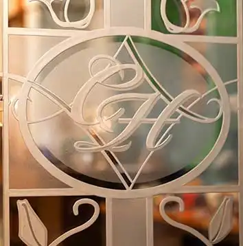 The Carlton Hotel Logo on Window